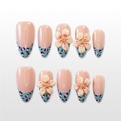 Handmade acrylic nails featuring animal print and floral nail art accents