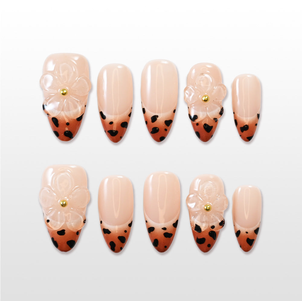 Nude French tip press-on nails with brown leopard print and clear 3D flower design