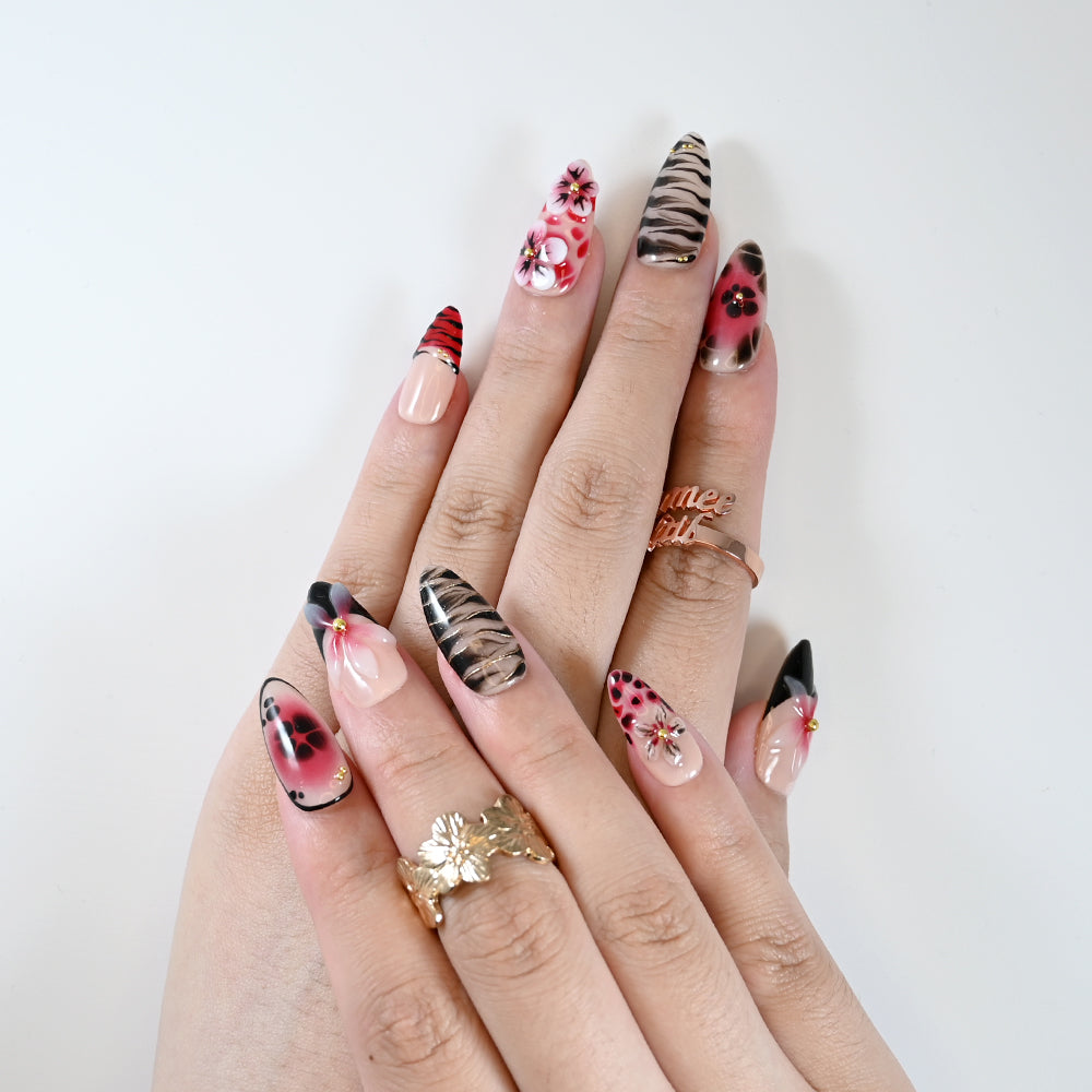 Sexy party press-on nails with red-black stripes and 3D floral details