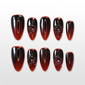Black and red ombre press-on nails with 3D carved floral design