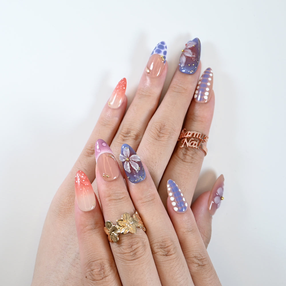 Reusable press-on nails with purple and pink gradient and 3D petals