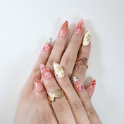 Reusable press-on nails with romantic red flower and golden leaf design