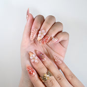 Handmade gradient nails with butterfly charm and marble design