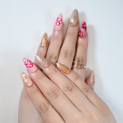 Charmeenail luxury acrylic nails in red marble with golden foil and 3D details