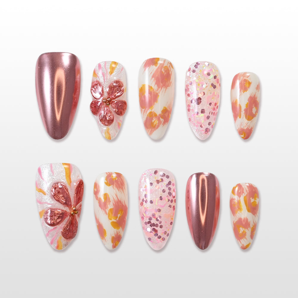 Rose gold chrome press-on nails with 3D flower and glitter accents