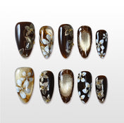 Handmade black and gold press on nails with white floral and shimmer design