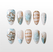 Handmade blue and white press on nails with 3D flower and gold chain design