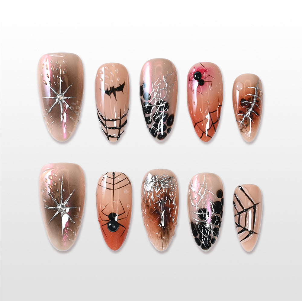 Handmade nude press on nails with black spider and silver web design