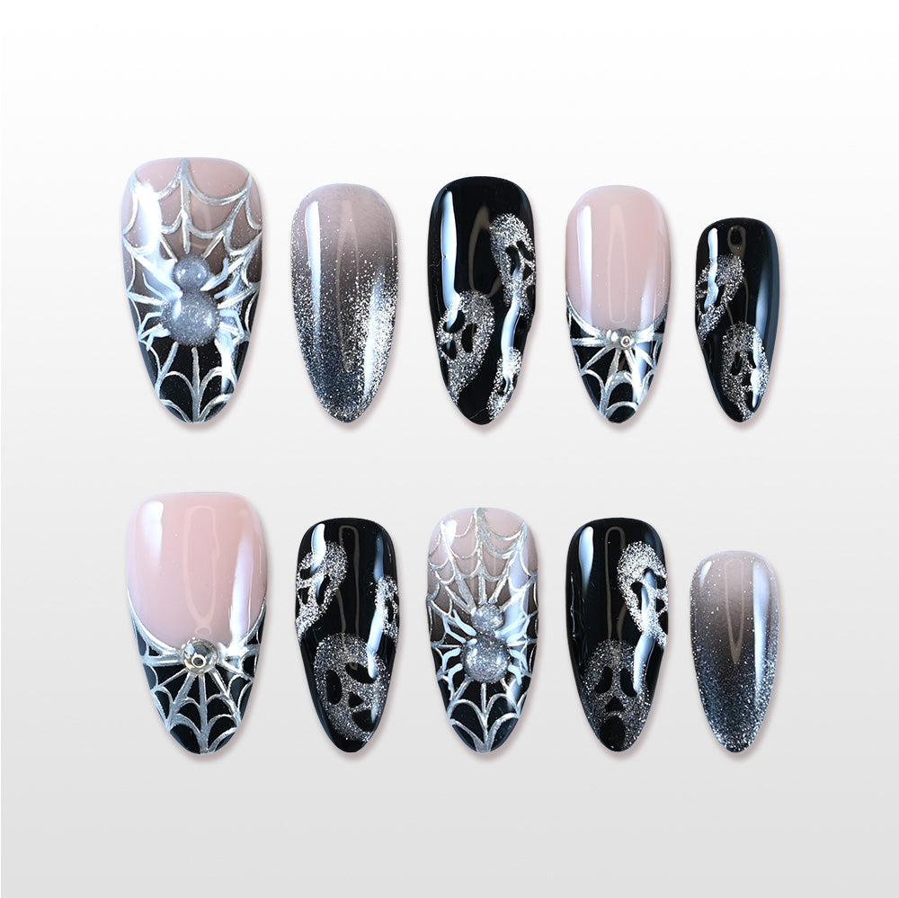 Handmade black and silver press on nails with 3D spider and web design