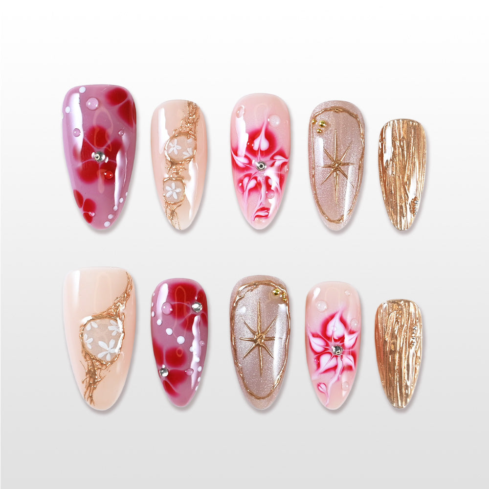 Handmade red and gold press on nails with marble floral and starburst design
