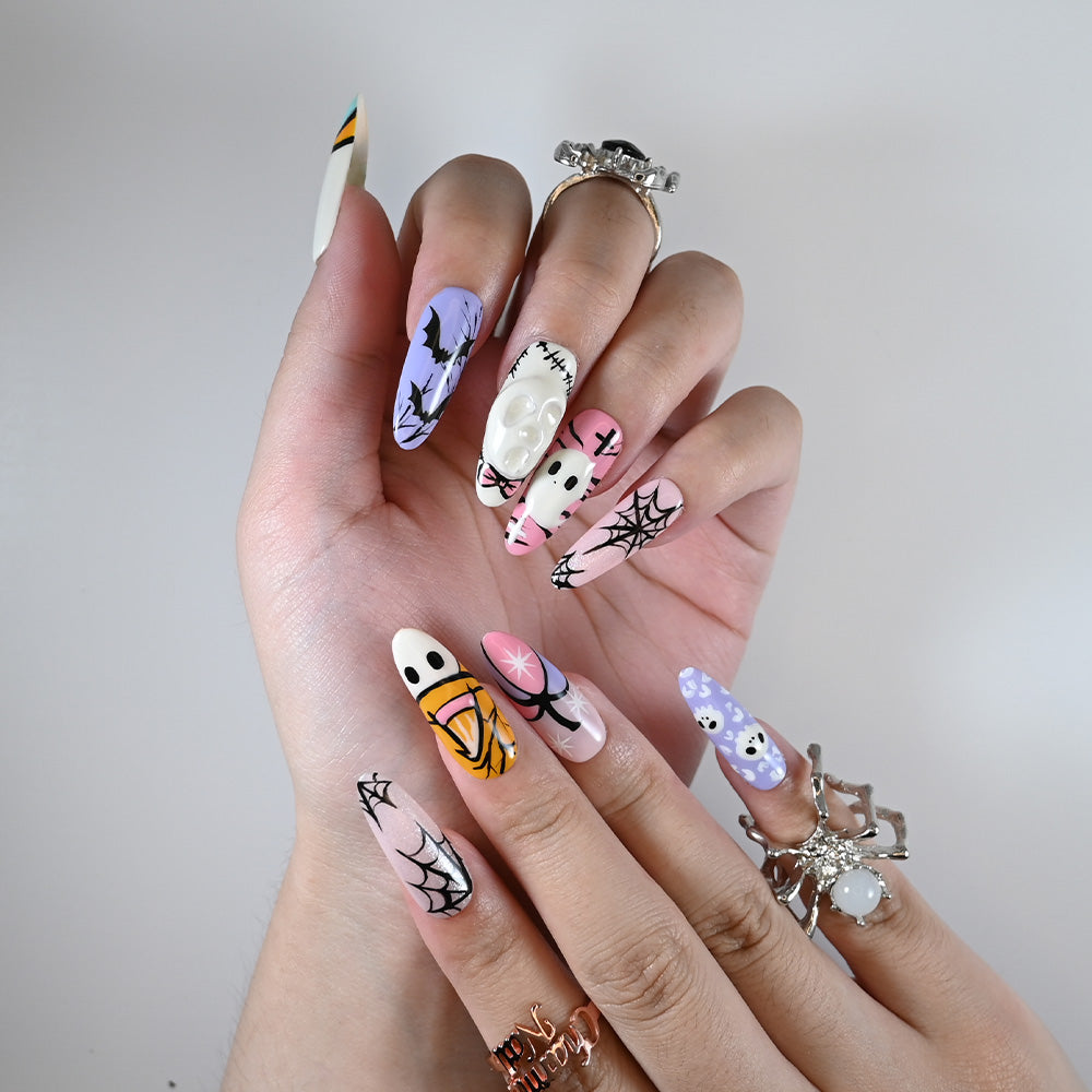 Long almond reusable press-on nails with 3D skull mask, pastel ghost art and cute spooky vibes