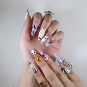 Long almond reusable press-on nails with 3D skull mask, pastel ghost art and cute spooky vibes