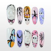 Handmade colorful Halloween press on nails with ghost, pumpkin, bat and spider web design