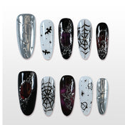 Handmade black, white and silver press on nails with spider web and bat Halloween design