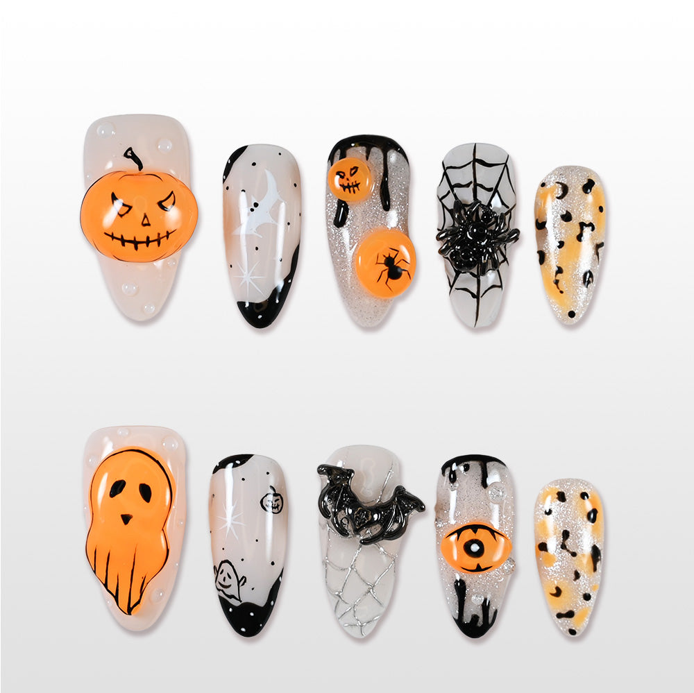 Handmade Halloween press on nails with 3D pumpkin, ghost, and spider web design