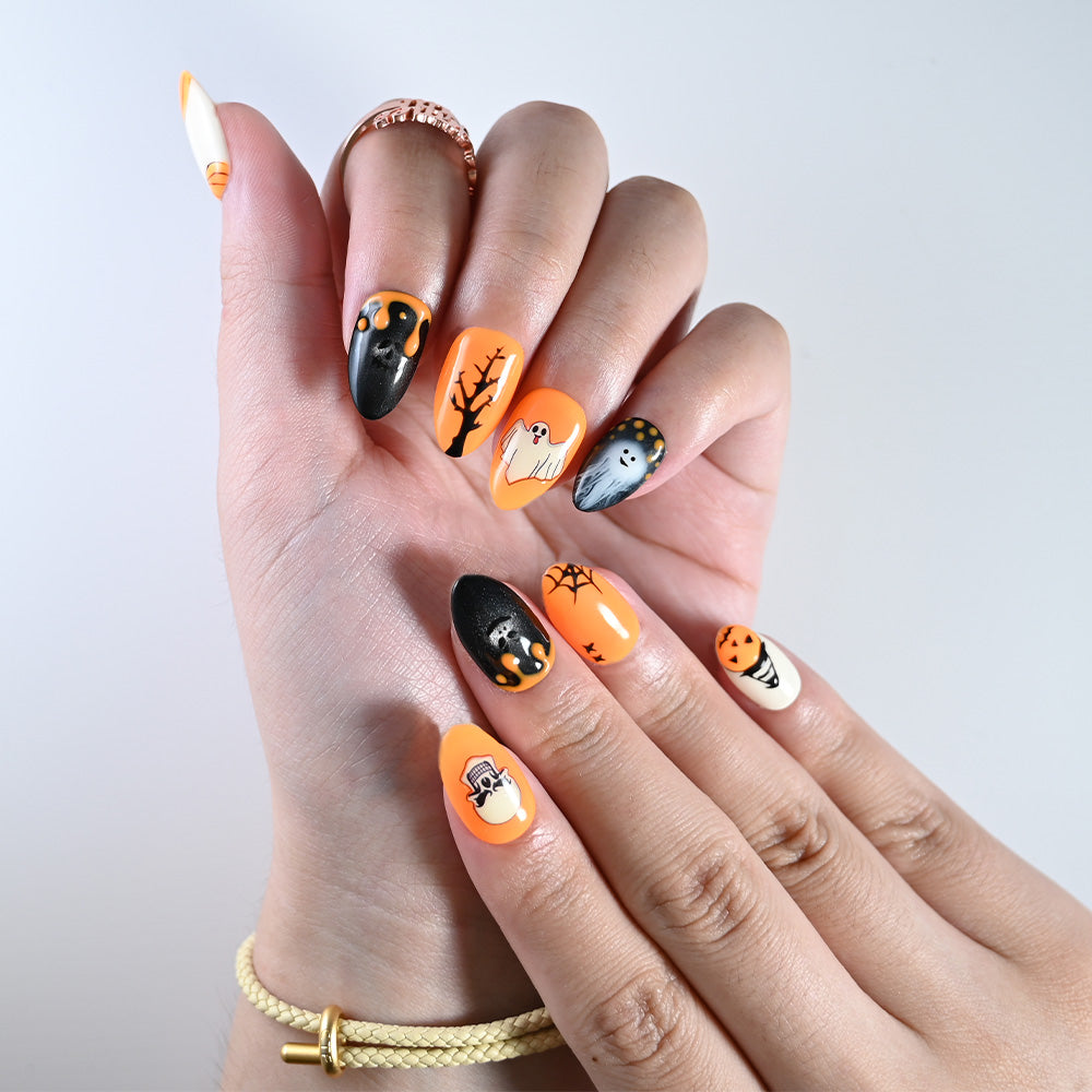 Charmeenail handmade press on nails featuring jack-o-lantern, ghost and spider web details