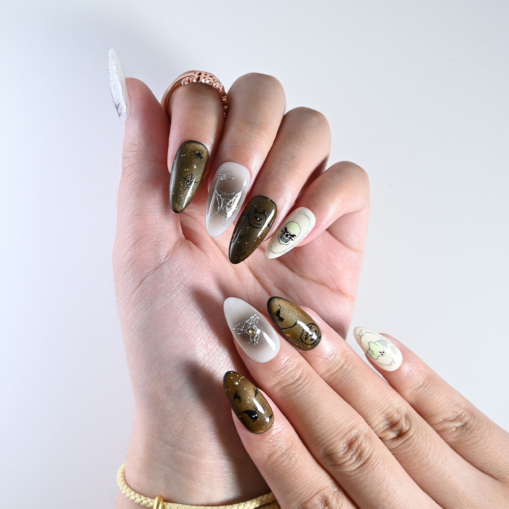 Charmeenail handmade Halloween press on nails featuring spider web, skull art and horror vibe