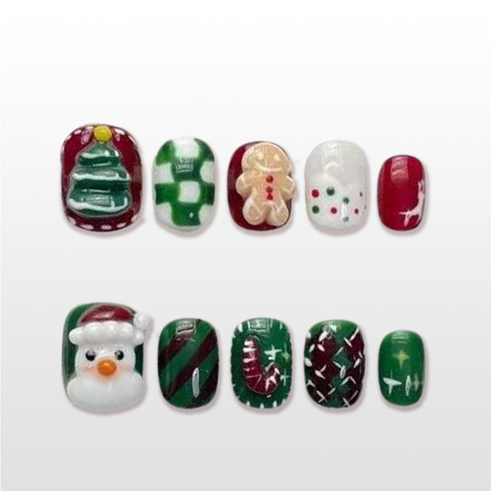Christmas press on nails with gingerbread man, snowman, and tree