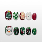 Christmas press on nails with gingerbread man, snowman, and tree