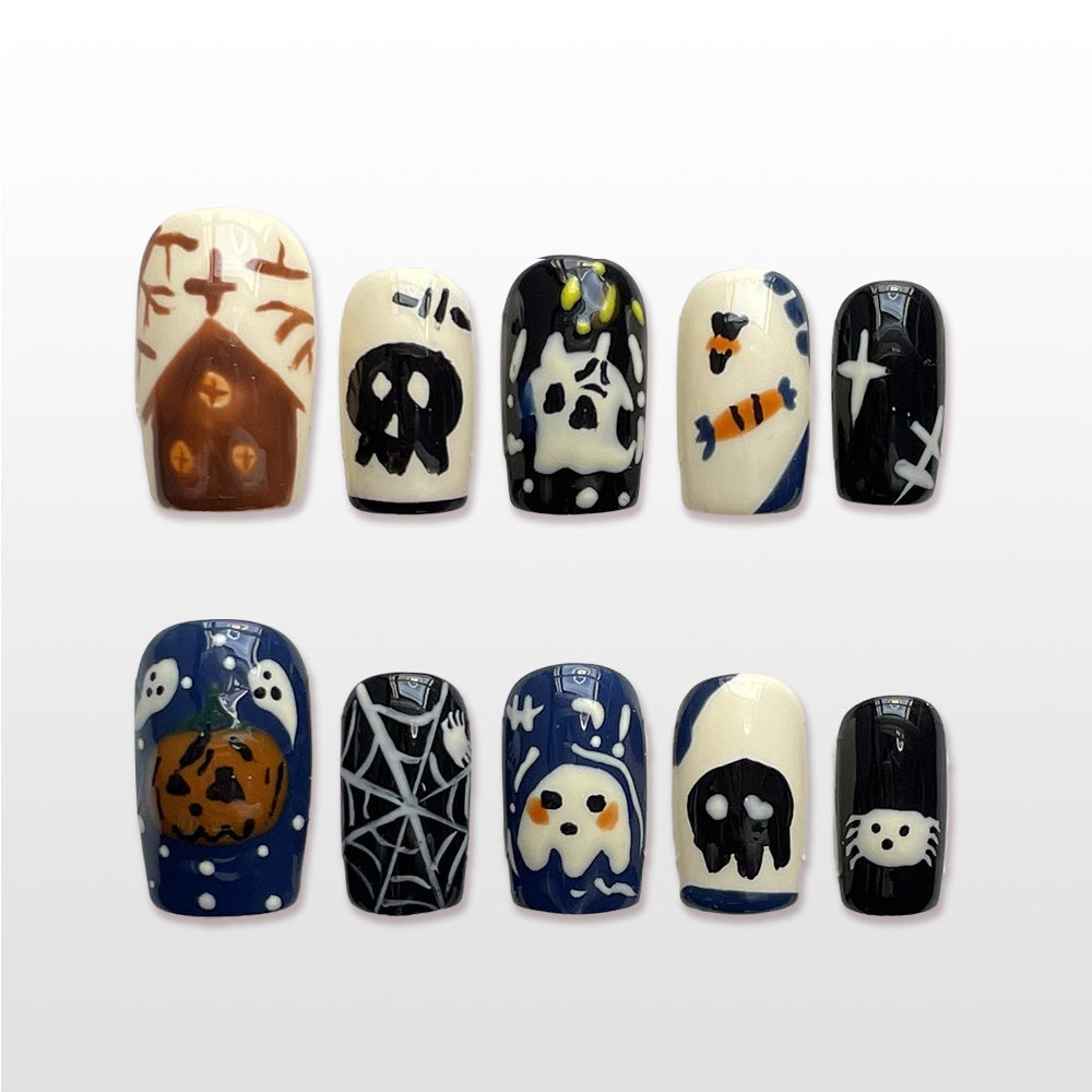 Halloween press on nails with haunted house, skulls, pumpkins, ghosts and spiders