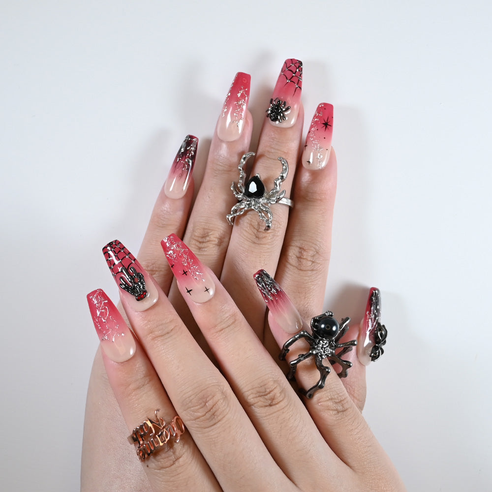 Charmeenail acrylic nails featuring black spiders, blood red tones, and Halloween horror style