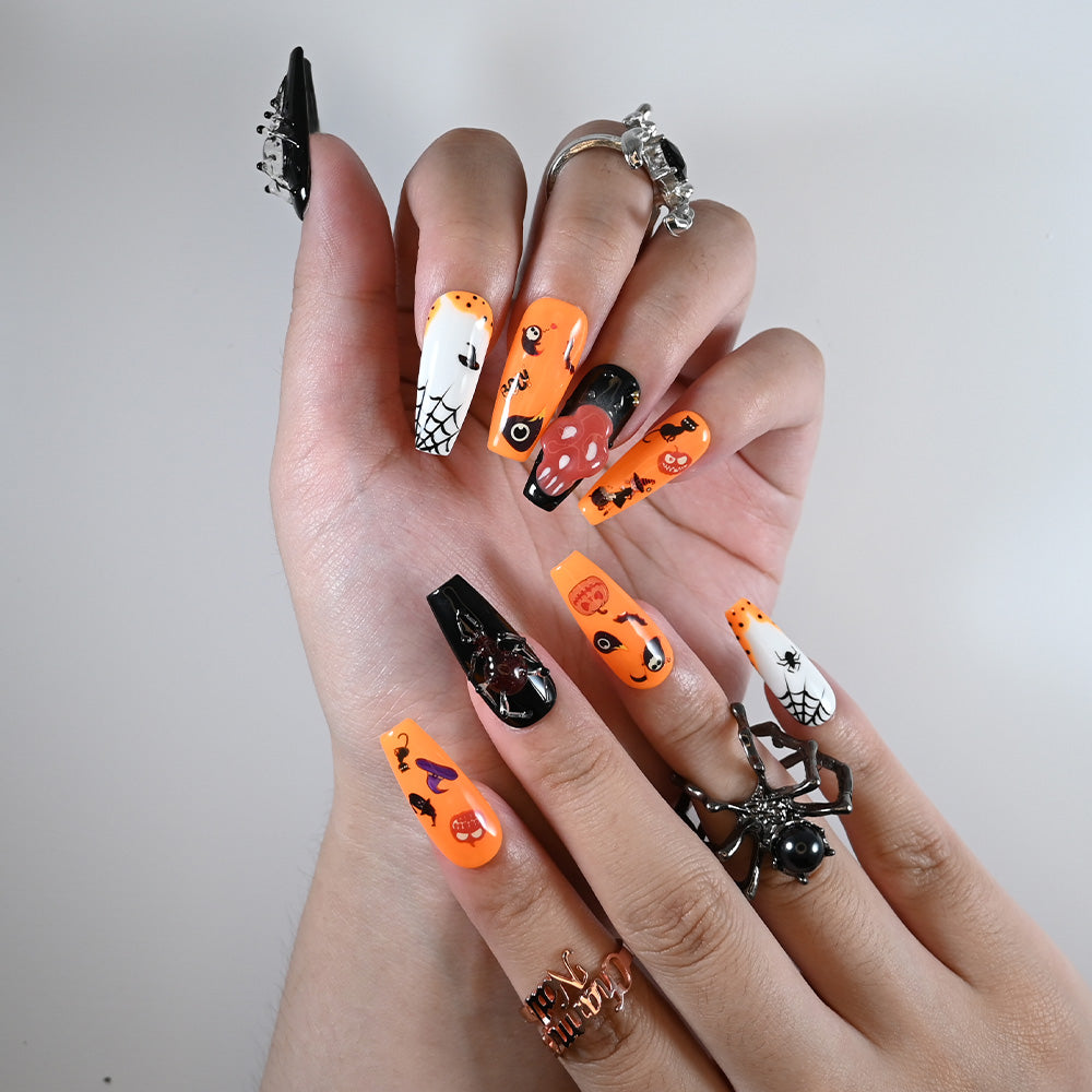 Medium coffin reusable press-on nails with pumpkin faces, cobwebs and spooky cat accents