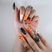 Medium coffin reusable press-on nails with pumpkin faces, cobwebs and spooky cat accents