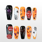 Handmade orange and black press on nails with 3D skull and glitter spider design