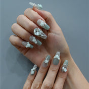 Luxury bridal press-on nails with mint roses, silver chains, and sparkling crystals