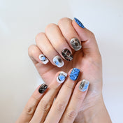 Handmade nails with ocean wave and cracked stone art design