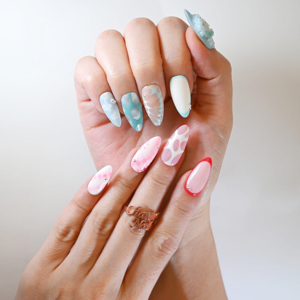 Handmade kawaii bunny nails with pastel pink, sky blue, and gradient patterns