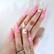 Kawaii style press-on nails with blue bunny, pastel sprinkles, and cute cartoon details