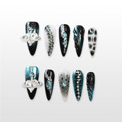 Handmade black and teal press on nails with crystal heart charm and metallic chain design