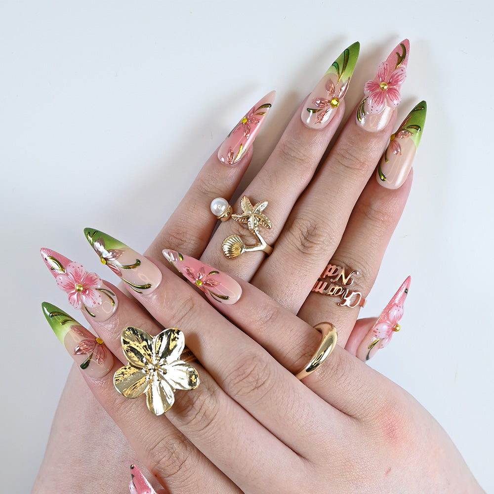 Luxury pink and green press-on nails with 3D blossom and gold details