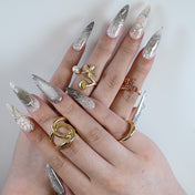 Luxury stiletto metallic nails with futuristic silver chrome accents