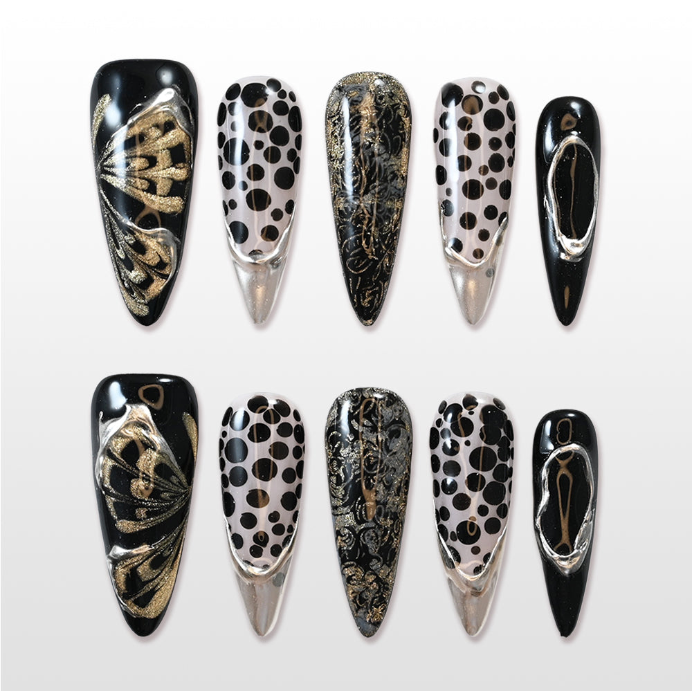 Black and gold butterfly press-on nails with metallic silver tips