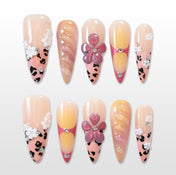 Pink leopard press-on nails with 3D flowers and glitter swirl design