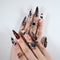 Charmeenail acrylic nails in dark horror style with spider web, blood splatter and chain accents