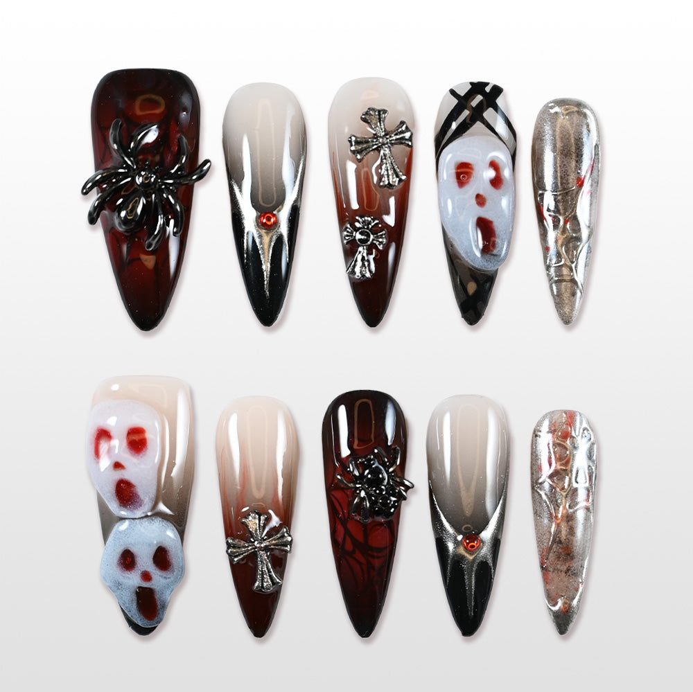 Handmade Halloween press on nails with 3D skulls, spider, and gothic cross design