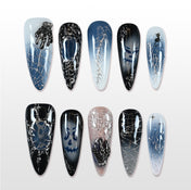Handmade blue and black press on nails with ghost faces, spider webs and cat design
