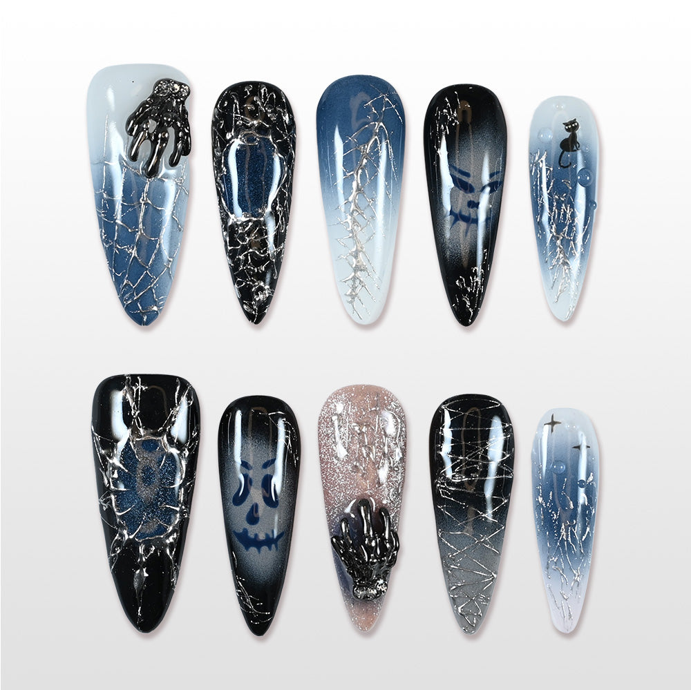 Handmade blue and black press on nails with ghost faces, spider webs and cat design