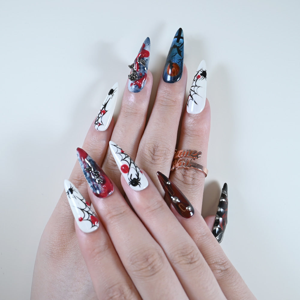 Handmade red, blue and white press on nails with spider web and gothic rose design