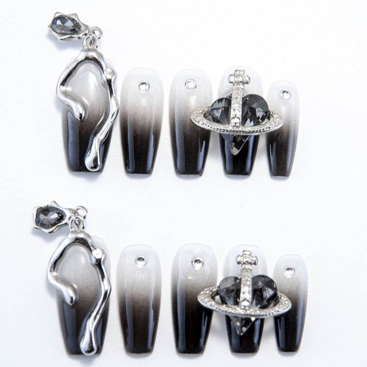 Handmade gradient nails with metallic 3D accents and dangling gemstone charm