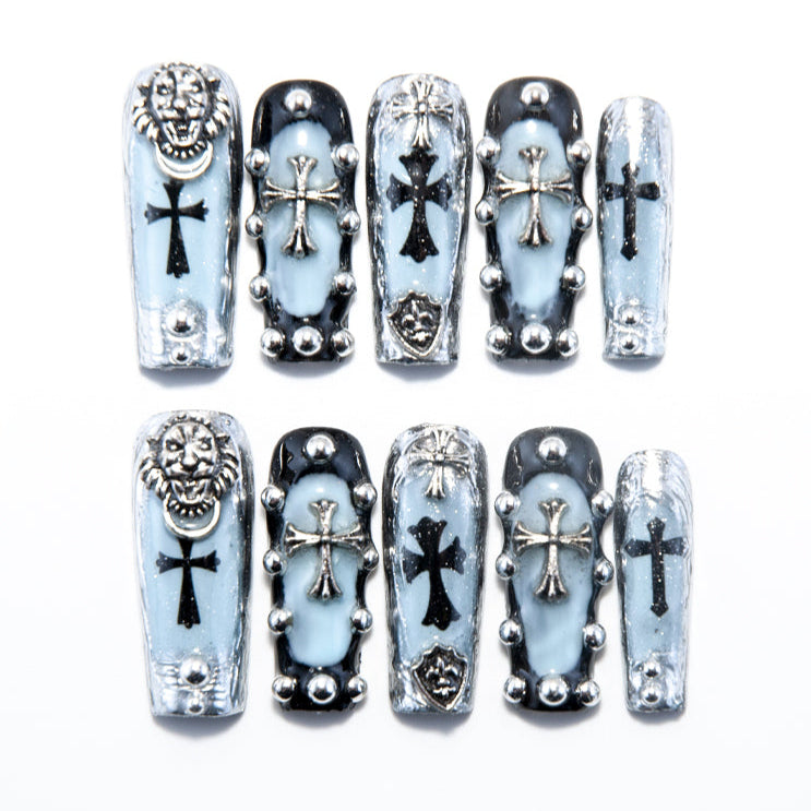 Black and silver gothic press-on nails with cross and lion head charms