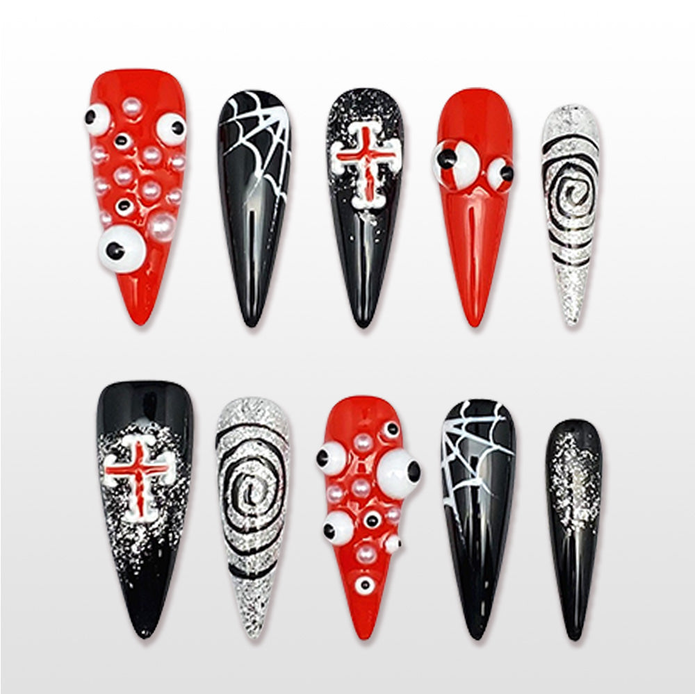 Handmade red and black stiletto press on nails with 3D eyeballs, spider web and cross design