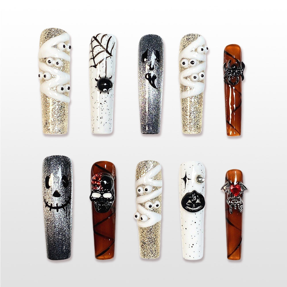 Handmade extra long coffin Halloween press on nails with mummy eyes, spider web and skull design