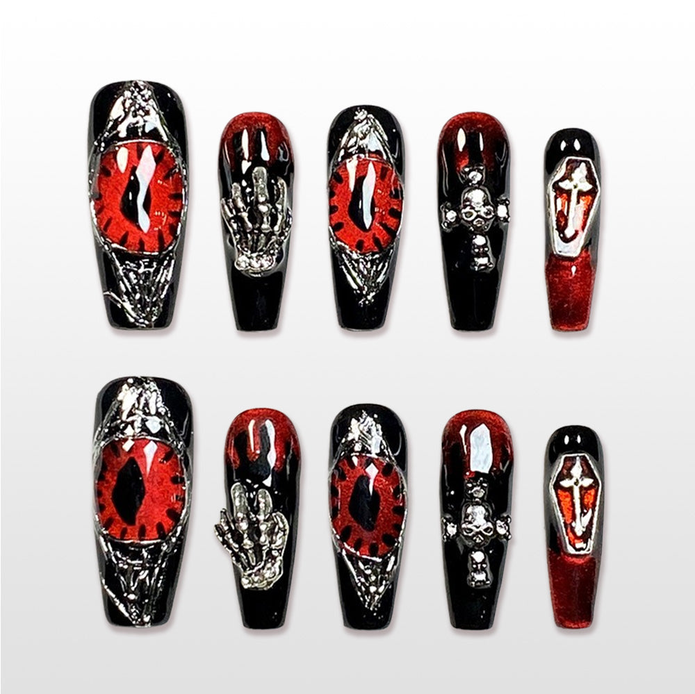 Handmade black and red Halloween press on nails with 3D evil eye and skeleton coffin design