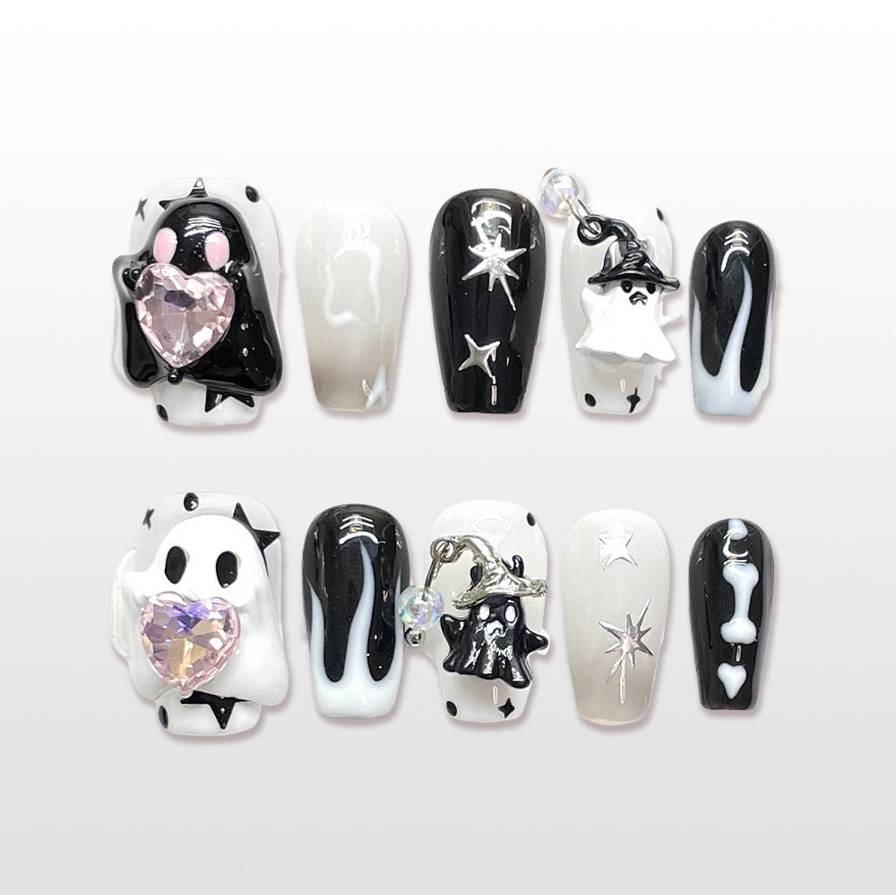 Short coffin  acrylic nails featuring 3D ghost charms, heart crystal and witch hat pendant