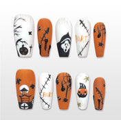 Handmade orange and white Halloween press on nails with pumpkin, spiderweb and ghost design