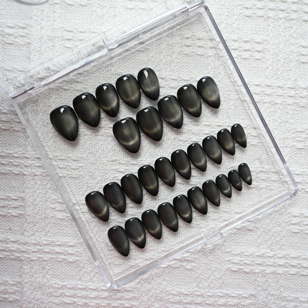 Charmeenail black cat eye press on nails with gold shimmer